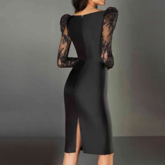 A black dress with a V-neck and a slim skirt